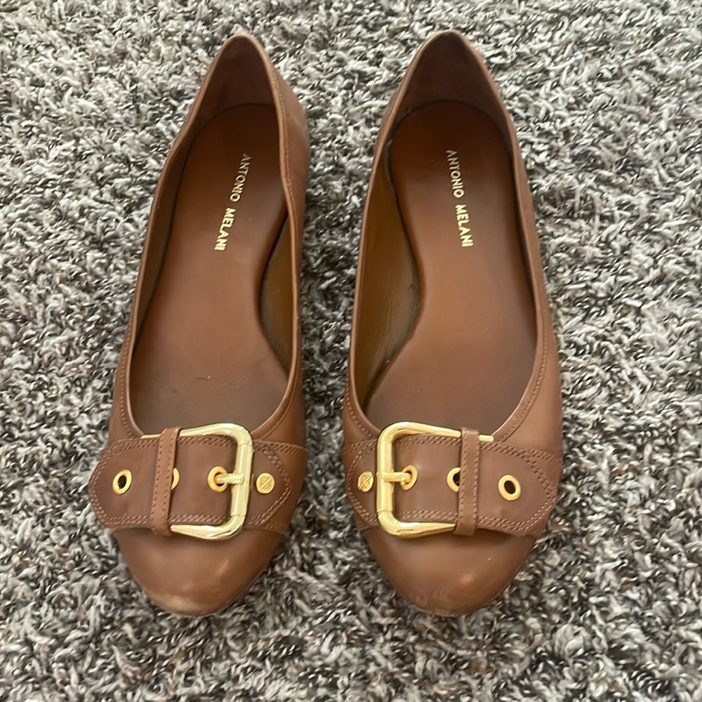 Tan ballet slippers.